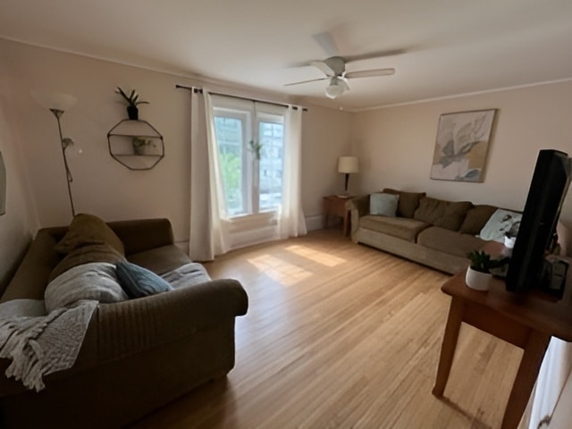 Goddard House: A living room area with TV and sofas