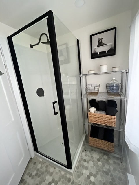 Goddard House: A clean bathroom with modern glass shower